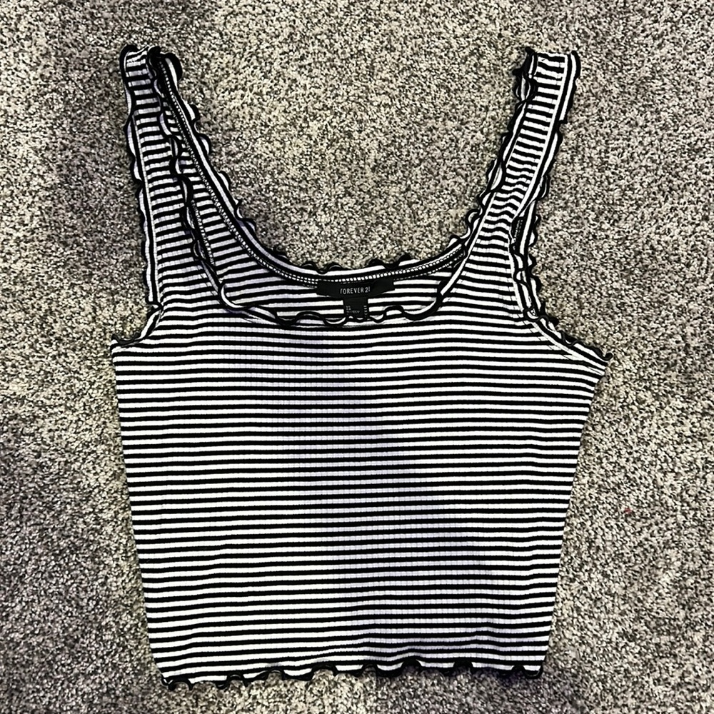 Black and White striped tank top from Forever 21. It is a size medium.